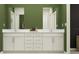 Double vanity bathroom with modern cabinets at 8337 Bella Mar Trl, Parrish, FL 34219