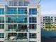 Condo balcony featuring glass railings, patio furniture, and stunning views for relaxing outdoor living at 912 Channelside Dr # 2601, Tampa, FL 33602