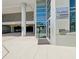 Elegant building entrance with glass doors, signage, and easy access to parking, creating a welcoming atmosphere at 912 Channelside Dr # 2601, Tampa, FL 33602