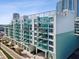 Modern condo building with multiple balconies offers city living with access to outdoor spaces at 912 Channelside Dr # 2601, Tampa, FL 33602