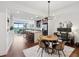 Open-concept living space features a kitchen island, dining area, and a view of the living room at 912 Channelside Dr # 2601, Tampa, FL 33602