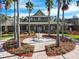 Community center with fountain and palm trees at 9202 Everwood Ct, Tampa, FL 33647