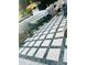 Backyard patio with decorative pavers and gravel at 11511 Meredith Ln, Port Richey, FL 34668