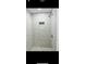 Clean shower with marble-style tile and built-in shelf at 11511 Meredith Ln, Port Richey, FL 34668