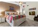 Main bedroom with king-size bed and farmhouse decor at 1307 Windjammer Pl, Valrico, FL 33594