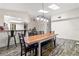 Dining room featuring stylish lighting, a large table with bench seating at 1307 Windjammer Pl, Valrico, FL 33594