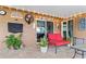 Cozy outdoor patio featuring outdoor seating, fan, string lights, and smooth brick flooring at 1307 Windjammer Pl, Valrico, FL 33594