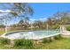 Inviting above-ground pool with surrounding grass at 1307 Windjammer Pl, Valrico, FL 33594