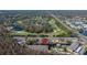 Aerial view highlighting condo location near lake and golf course at 14625 Par Club Cir, Tampa, FL 33618