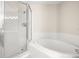 Bathroom with shower and garden tub at 14625 Par Club Cir, Tampa, FL 33618