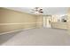 Living area with neutral walls and carpet at 14625 Par Club Cir, Tampa, FL 33618