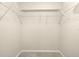 Spacious walk-in closet with wire shelving at 14625 Par Club Cir, Tampa, FL 33618