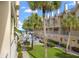 Complex with lush landscaping, pool, and ocean view at 17960 Gulf Blvd # 115, Redington Shores, FL 33708