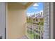 Private balcony overlooking courtyard and neighboring building at 17960 Gulf Blvd # 115, Redington Shores, FL 33708
