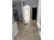 Kitchen with tile floor and a view into the dining area at 18229 Port Side St, Tampa, FL 33647