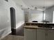 Kitchen with granite countertops and white cabinets at 18229 Port Side St, Tampa, FL 33647
