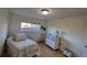 Cozy bedroom with a comfortable bed and ample closet space at 2348 Shelley St # 4, Clearwater, FL 33765