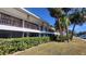 Building exterior showcasing a well-maintained building with lush landscaping at 2348 Shelley St # 4, Clearwater, FL 33765
