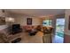 Spacious living room with comfortable seating and a large TV at 2348 Shelley St # 4, Clearwater, FL 33765
