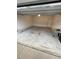 Spacious and unfinished single car garage with white walls at 2409 Hearth Dr, Odessa, FL 33556
