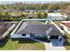 Aerial view of renovated home and yard at 26728 Hickory Loop, Lutz, FL 33559