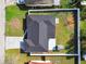 Aerial top-down view of a house and backyard at 26728 Hickory Loop, Lutz, FL 33559