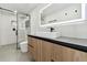 Modern bathroom with floating vanity and glass shower at 26728 Hickory Loop, Lutz, FL 33559