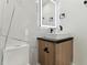 Stylish bathroom with floating vanity and a sleek mirror at 26728 Hickory Loop, Lutz, FL 33559