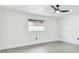 Bright bedroom with ceiling fan and large closet at 26728 Hickory Loop, Lutz, FL 33559