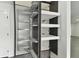 Well-organized pantry with pull-out shelves and ample storage space at 26728 Hickory Loop, Lutz, FL 33559