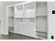 Large walk-in closet with custom built-in shelving at 26728 Hickory Loop, Lutz, FL 33559
