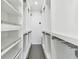 Spacious walk-in closet with ample shelving and hanging space at 26728 Hickory Loop, Lutz, FL 33559