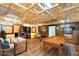 Spacious finished basement with exposed ceiling beams, entertainment area, and ample space for recreation and relaxation at 3406 Ranchdale Dr, Plant City, FL 33566