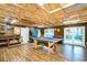 Large, unfinished basement with wood floors and a huge work area ready for your personal touch! at 3406 Ranchdale Dr, Plant City, FL 33566