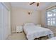 Bedroom with ceiling fan, closet, neutral decor, and plenty of light at 3406 Ranchdale Dr, Plant City, FL 33566