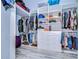 Well-organized walk-in closet with shelving and drawers at 3406 Ranchdale Dr, Plant City, FL 33566