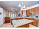 Beautiful kitchen featuring stainless steel appliances, granite counters and open to a casual seating area at 3406 Ranchdale Dr, Plant City, FL 33566