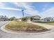 Charming single-story home featuring a well-manicured lawn, long driveway and lovely curb appeal at 35934 Verano Ln, Zephyrhills, FL 33541