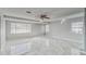 Spacious living room with marble floors and large windows at 404 13Th Sw St, Ruskin, FL 33570