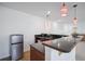 Wet bar includes a sink, wine rack and mini fridge at 4735 Rolling Green Dr, Wesley Chapel, FL 33543