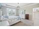 Comfortable bedroom with plenty of natural light and a serene atmosphere at 4735 Rolling Green Dr, Wesley Chapel, FL 33543