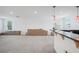 Spacious bonus room with recessed lighting, neutral carpet, and a bar counter at 4735 Rolling Green Dr, Wesley Chapel, FL 33543