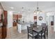 Eat-in kitchen features stylish light fixtures and ample storage space for the home chef at 4735 Rolling Green Dr, Wesley Chapel, FL 33543