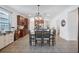 Eat-in kitchen features stylish light fixtures and ample storage space for the home chef at 4735 Rolling Green Dr, Wesley Chapel, FL 33543
