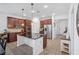 Beautiful kitchen featuring stainless steel appliances, a large island, and ample cabinet space at 4735 Rolling Green Dr, Wesley Chapel, FL 33543