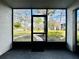 Enclosed lanai with views of the well-maintained greenery of the community at 4910 Bay Ne St # 103, St Petersburg, FL 33703