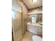 Clean bathroom with shower, vanity, and tiled floor at 8040 Pasadena Dr, Port Richey, FL 34668