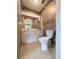 Bathroom with toilet, vanity, and tiled floor at 8040 Pasadena Dr, Port Richey, FL 34668