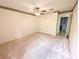 Spacious bedroom with double door closet and carpet at 8040 Pasadena Dr, Port Richey, FL 34668