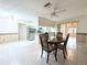 Dining area with tile floor and wood table with chairs at 8040 Pasadena Dr, Port Richey, FL 34668